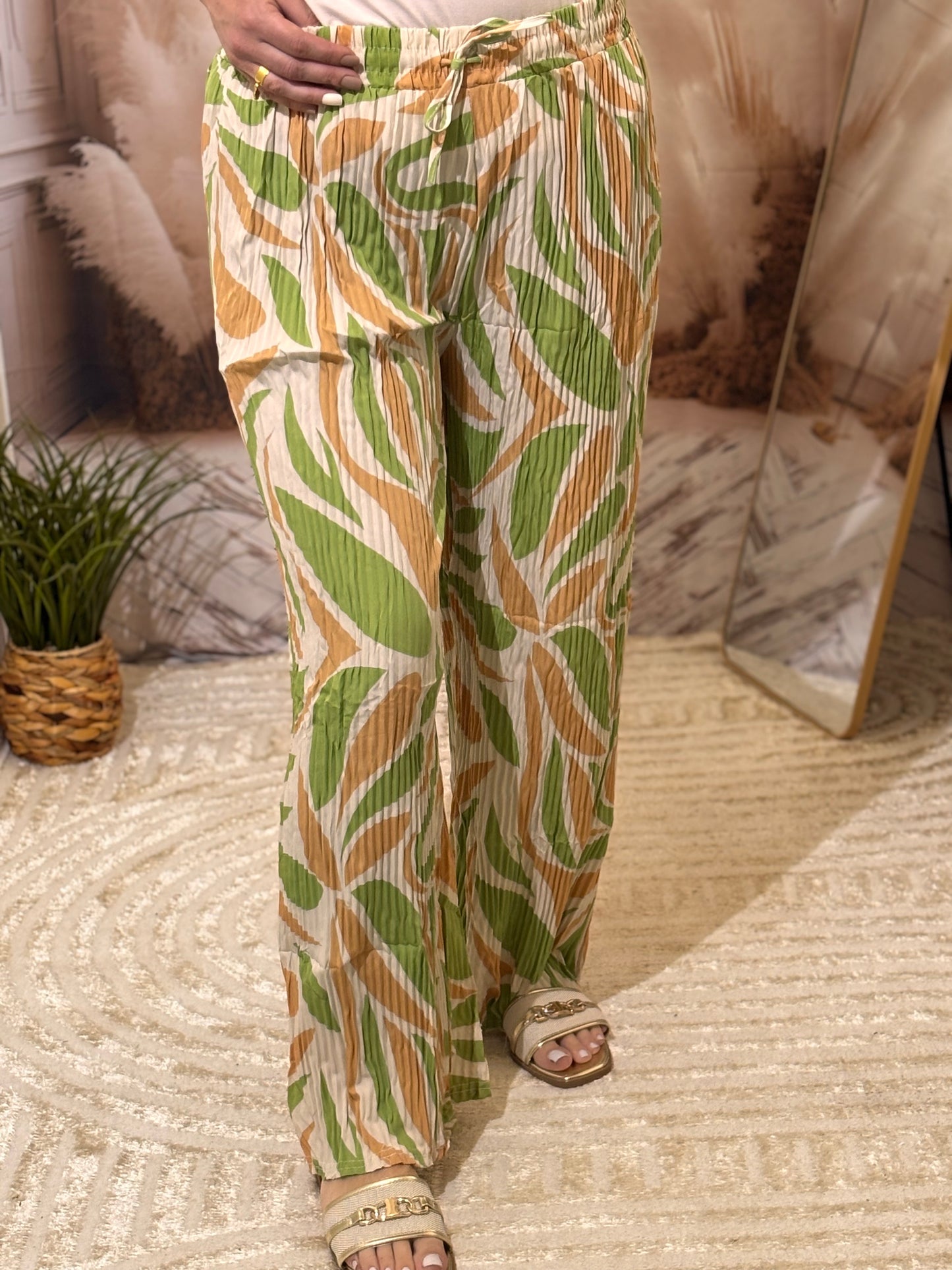 Pantalon motifs vert